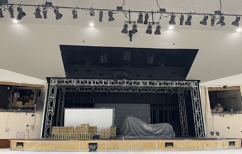 Work on the stage lighting upgrade at Harvest Church commences.