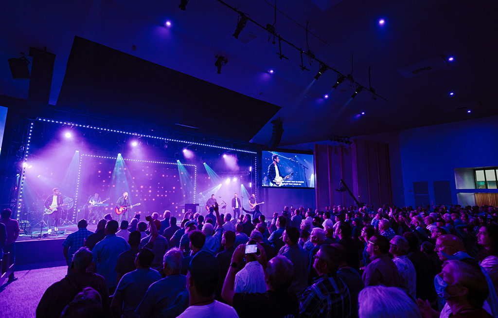 A congregation enjoys a worship service at Harvest Church.